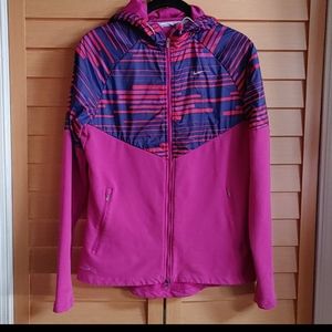 Womens pink Nike zip up dri-fit track jacket with hood. Size medium.